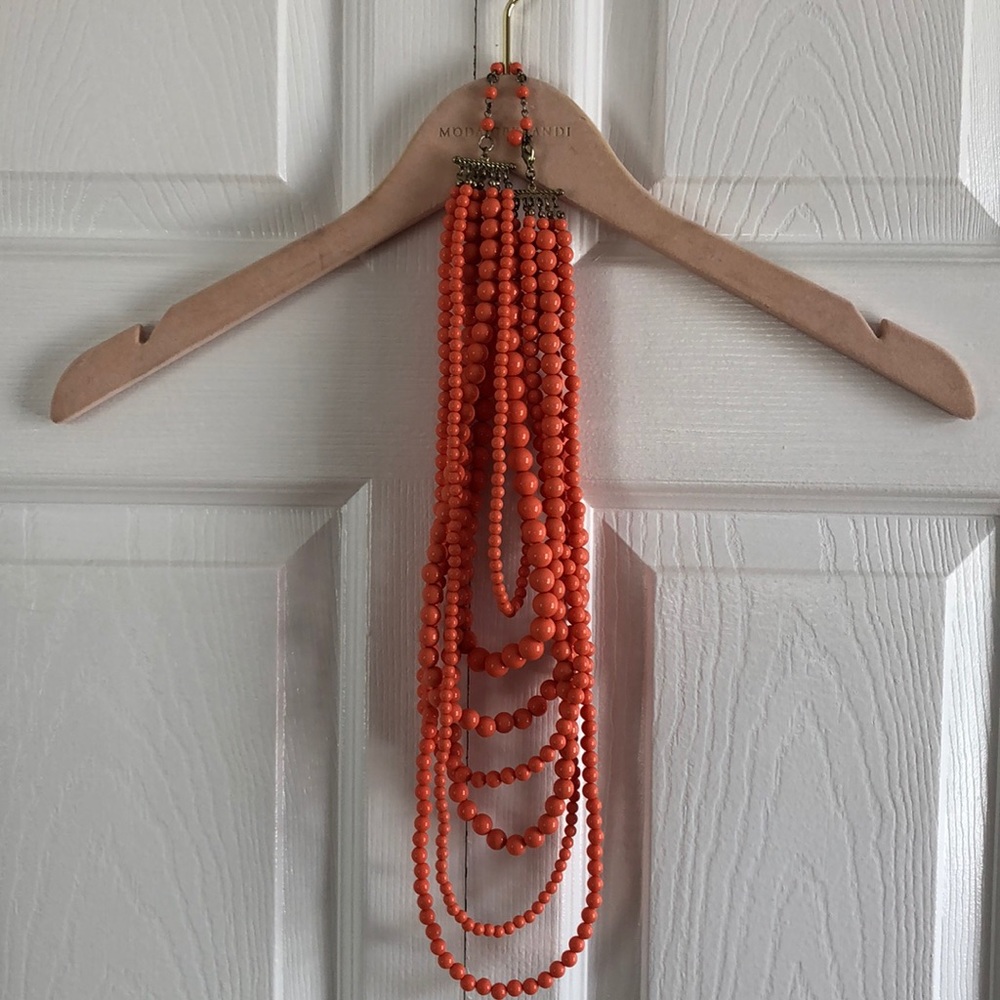 Layered orange beaded necklace